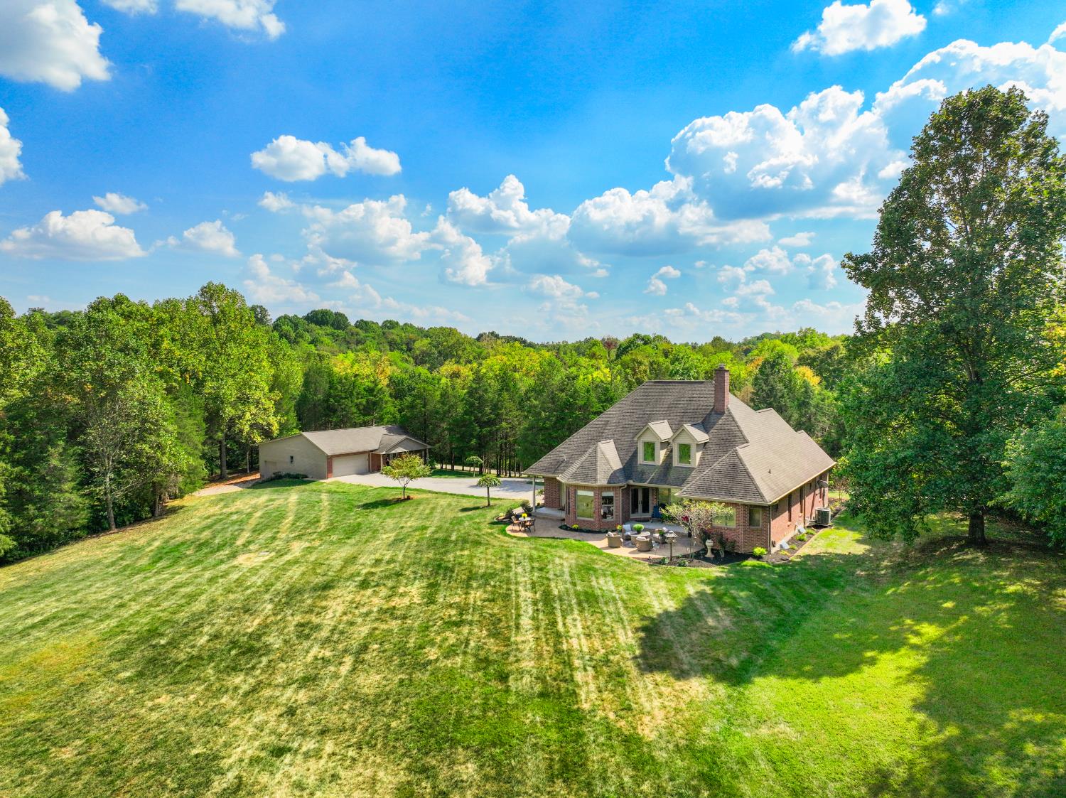 Total Privacy...exquisite privacy! 8.6 acres with woods and open lawns!