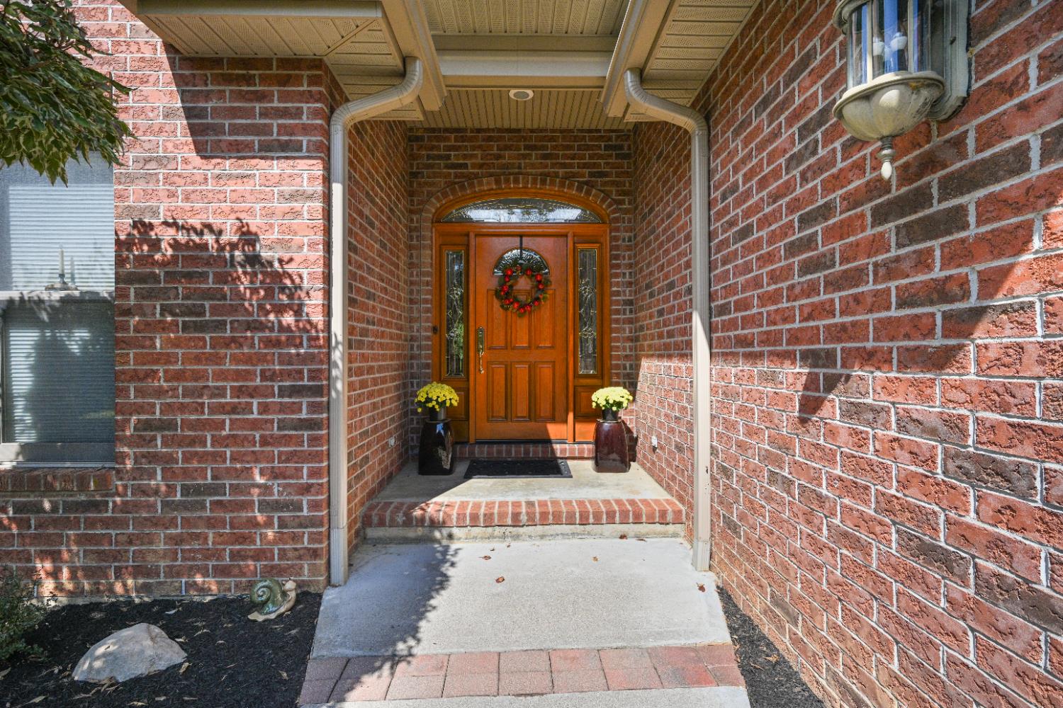 12656 Asche Road Sunman, IN 47041 - Photo 11 of 82 Beautifully refinished solid wood door is surrounded by leaded glass transom & sidelites...