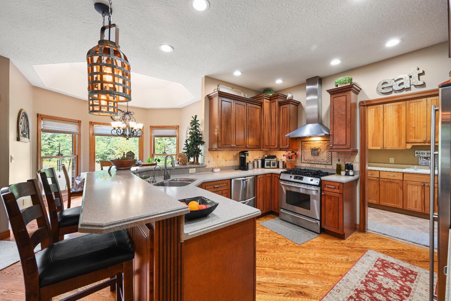 12656 Asche Road Sunman, IN 47041 - Photo 16 of 82 A bar height counter bar is great for quick meals or entertaining...