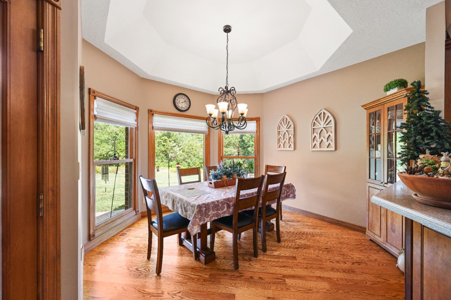 12656 Asche Road Sunman, IN 47041 - Photo 22 of 82 Spacious Dining Room with matching corner curio cabinet & hardwood floors