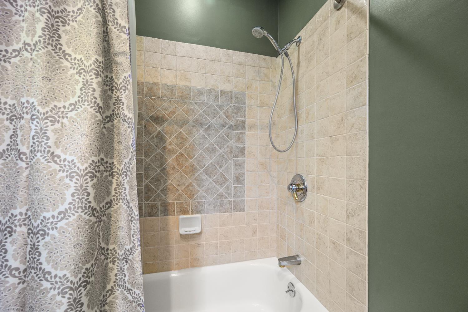 12656 Asche Road Sunman, IN 47041 - Photo 40 of 82 Close up of hall bath tub shower tile