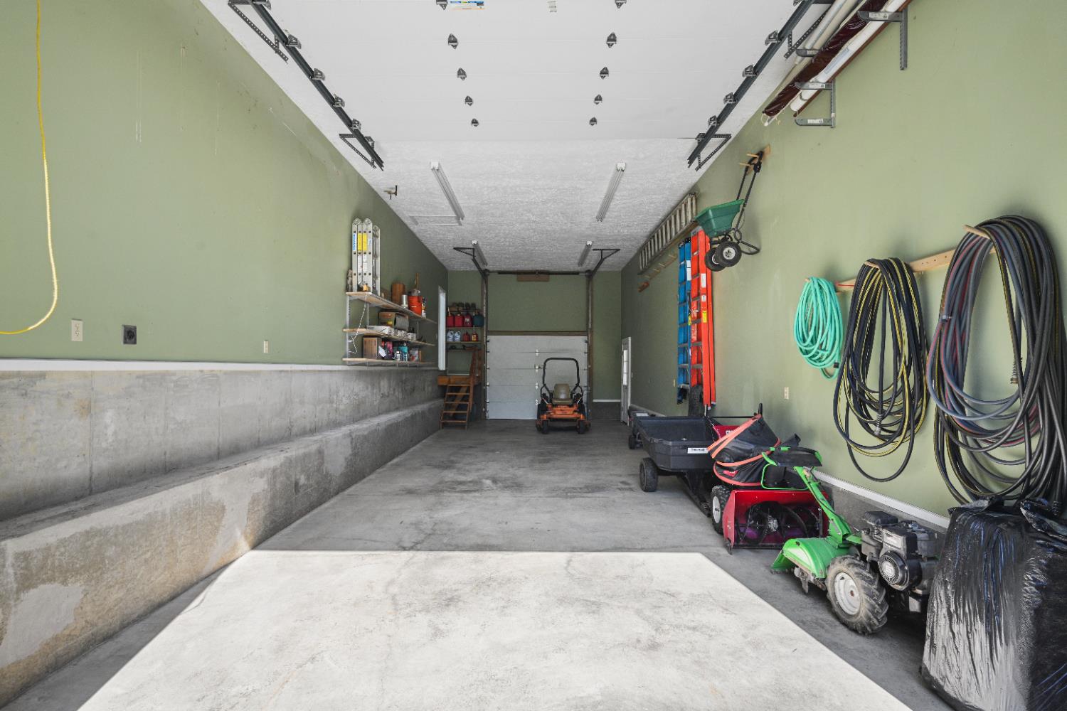 12656 Asche Road Sunman, IN 47041 - Photo 60 of 82 View of the RV garage from the high door, showing the standard door on the the end