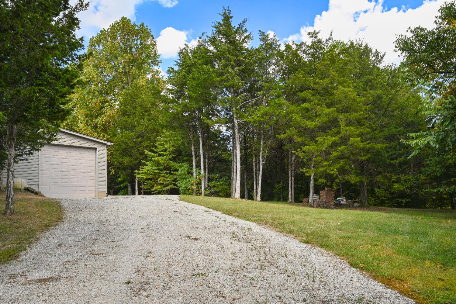 12656 Asche Road Sunman, IN 47041 - Photo 62 of 82 Driveway leasing to the RV door