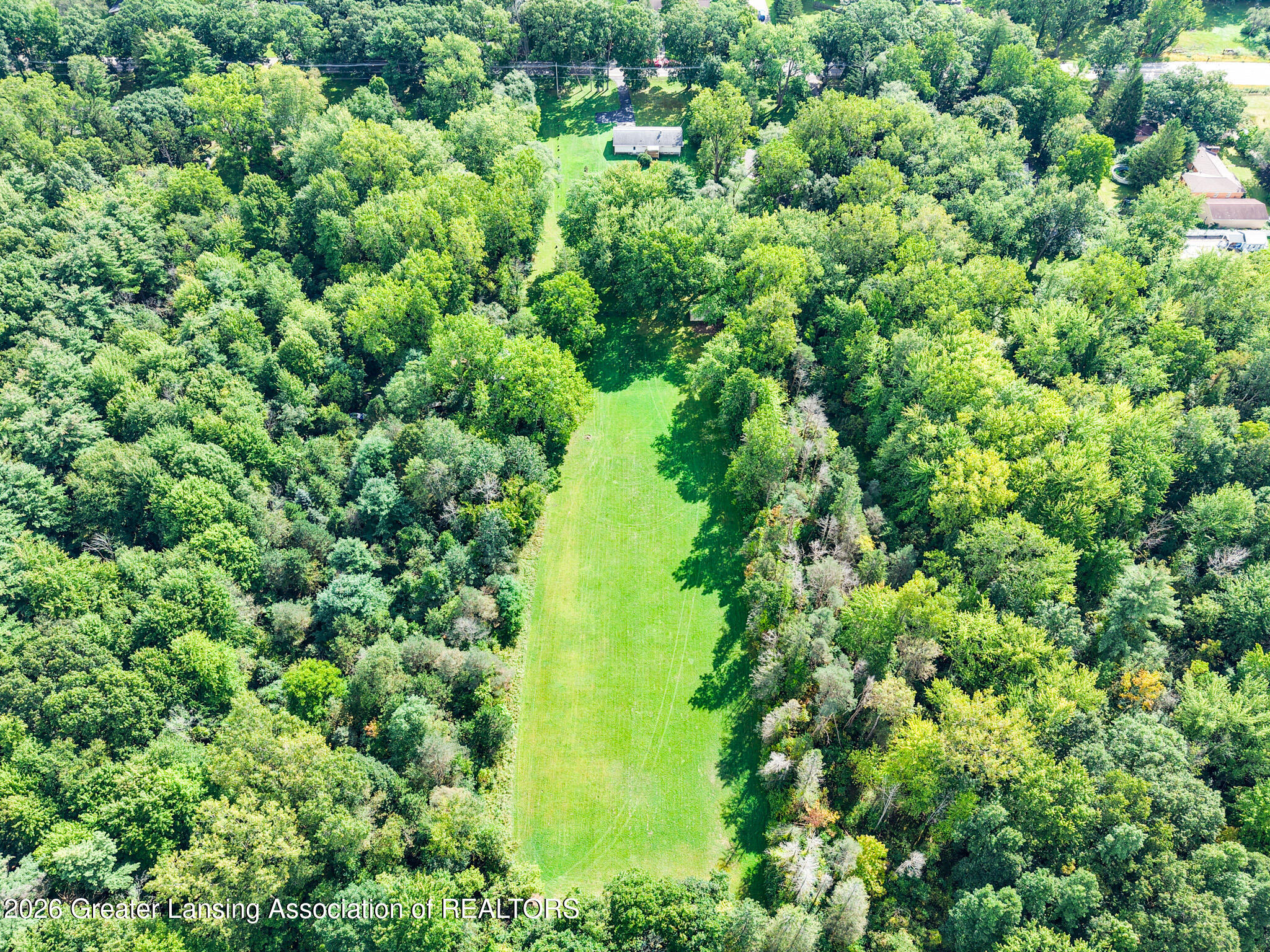 4497 Meridian Road Okemos, MI 48864 - Photo 52 of 58 DJI_20260910113733_0036_D