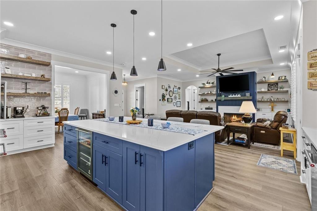 825 Arch Tanner Road Bethlehem, GA 30620 - Photo 15 of 58 a large kitchen with stainless steel appliances kitchen island granite countertop a large island in the center