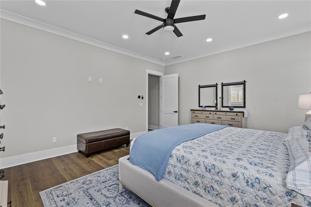 825 Arch Tanner Road Bethlehem, GA 30620 - Photo 26 of 58 a bedroom with a bed and a television