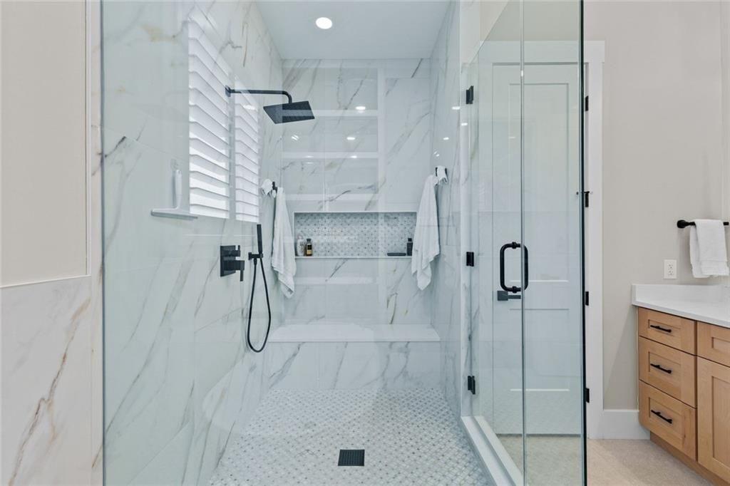 825 Arch Tanner Road Bethlehem, GA 30620 - Photo 30 of 58 a bathroom with a shower and a tub