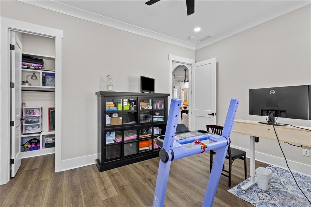 825 Arch Tanner Road Bethlehem, GA 30620 - Photo 32 of 58 a view of a livingroom with workspace and a window