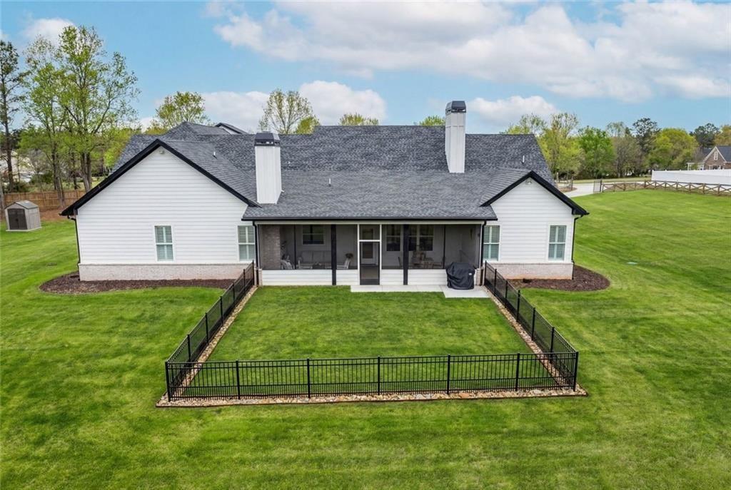 825 Arch Tanner Road Bethlehem, GA 30620 - Photo 52 of 58 a view of a house with a backyard