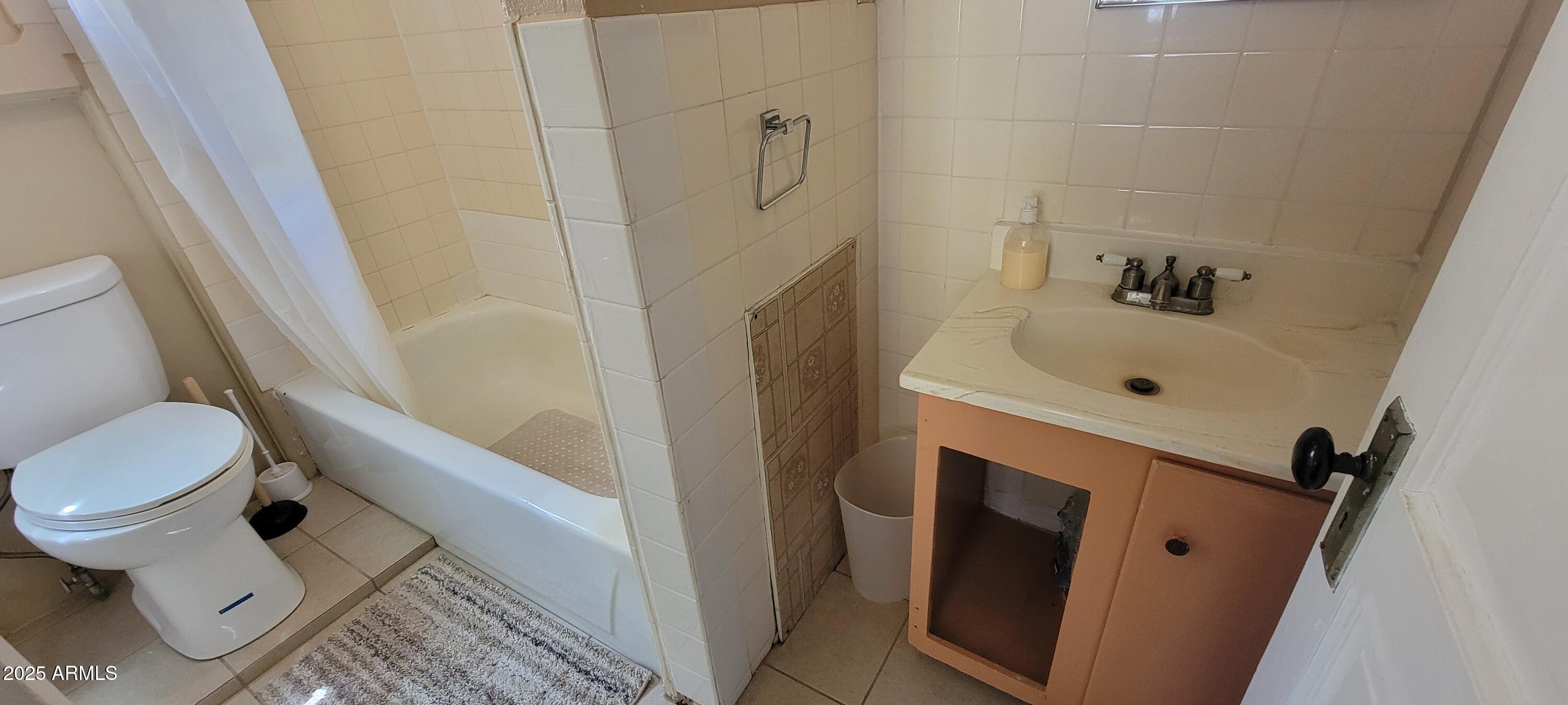 416 Tombstone Canyon Bisbee, AZ 85603 - Photo 37 of 42 a bathroom with a sink and a toilet