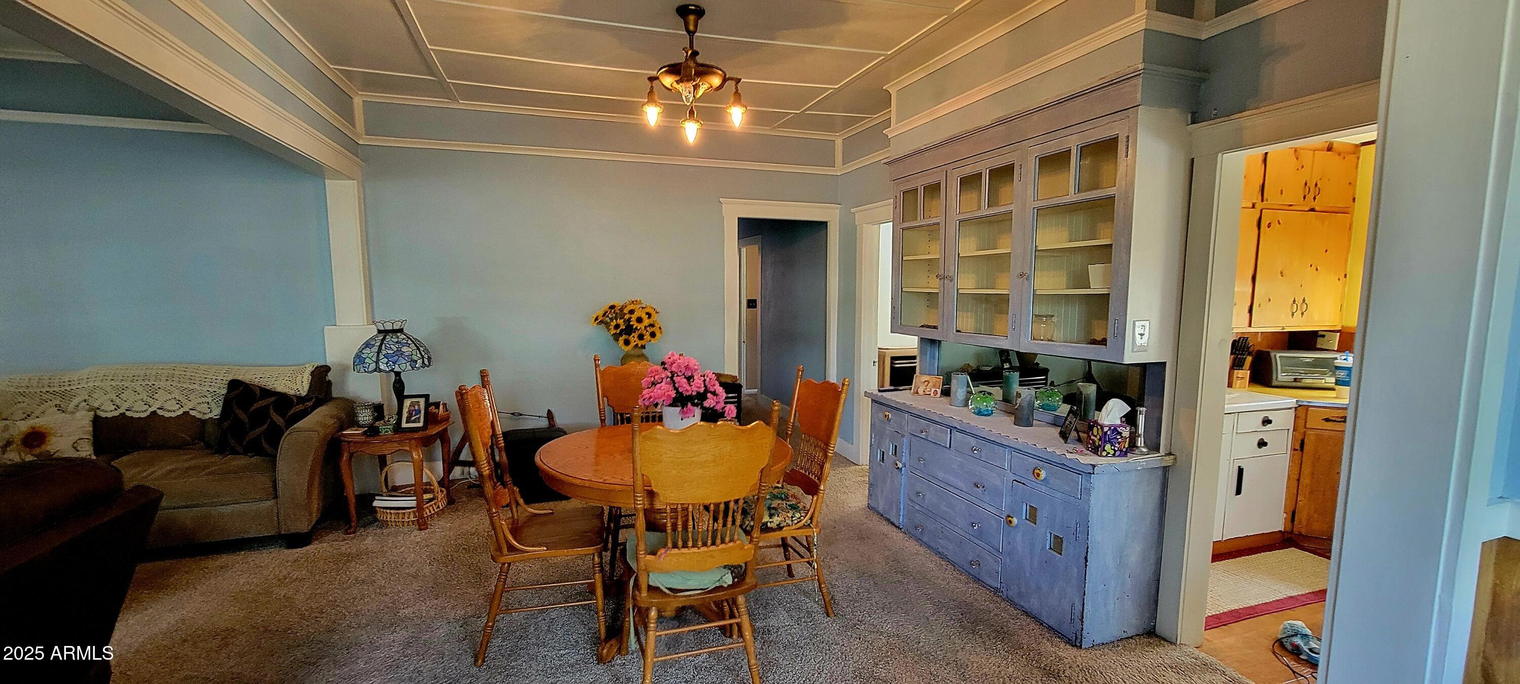 416 Tombstone Canyon Bisbee, AZ 85603 - Photo 5 of 42 a dining room with furniture and window