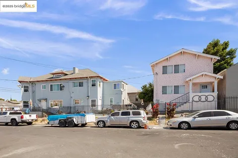 a view of a city street with cars