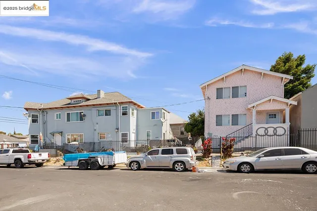 a view of a city street with cars