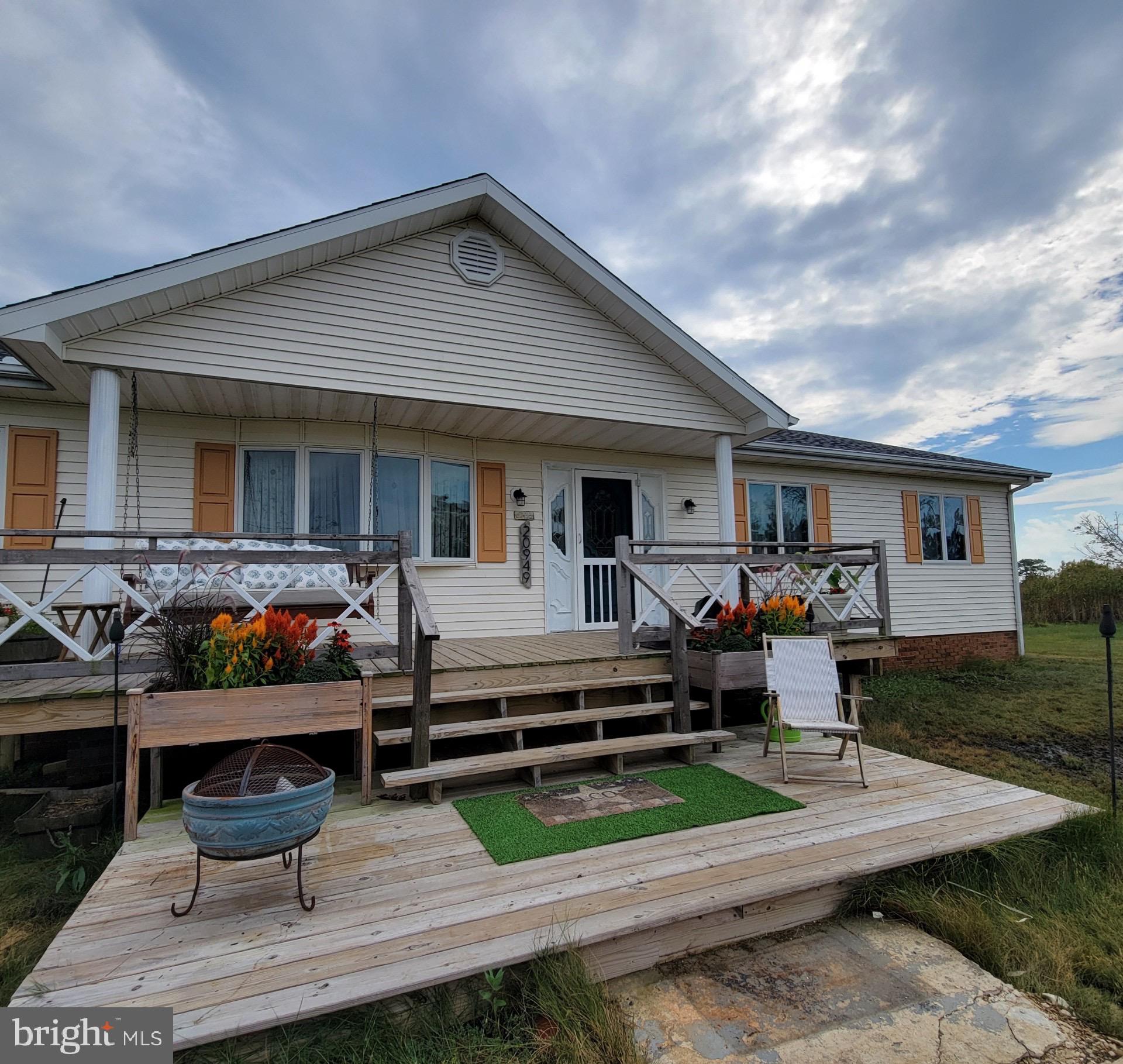 a front view of a house with porch