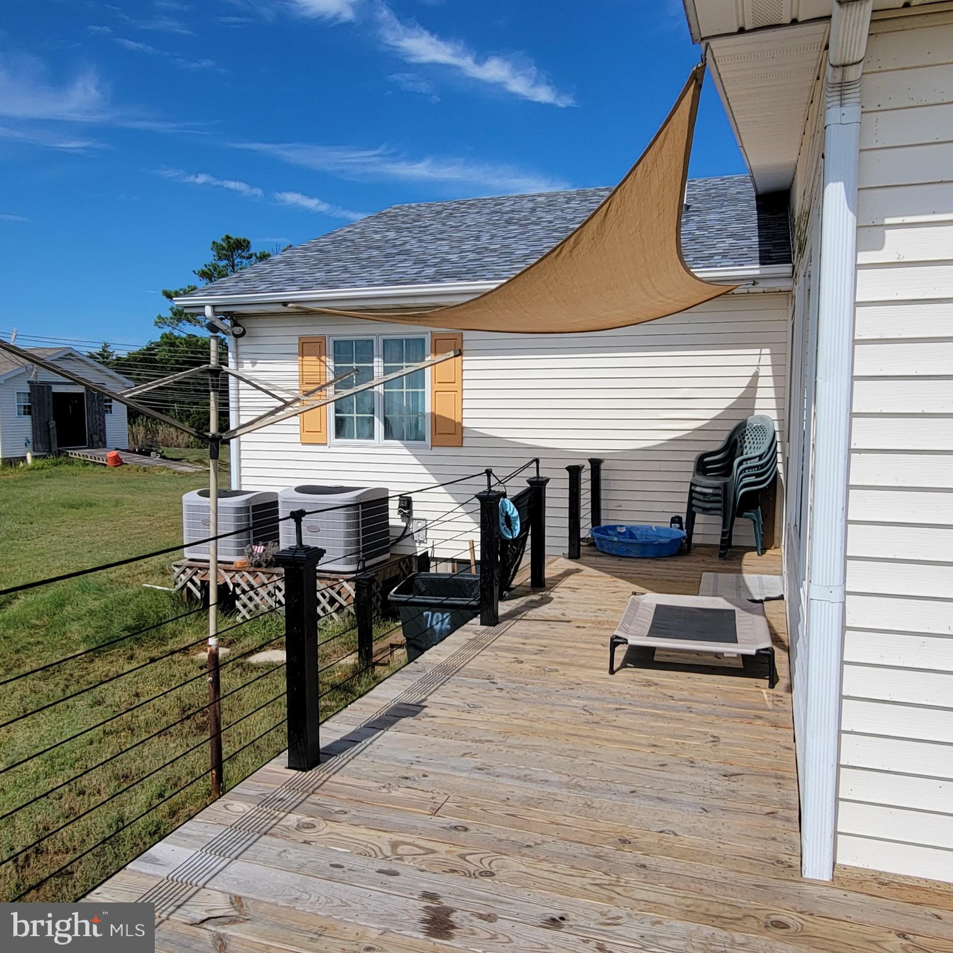 20949 Somers Road Ewell, MD 21824 - Photo 12 of 55 Side of the back deck