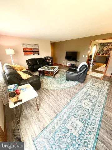 a view of a terrace with seating area