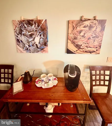 a spacious bedroom with a bed and a window