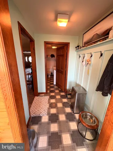 a spacious bathroom with a sink a mirror and a bathtub