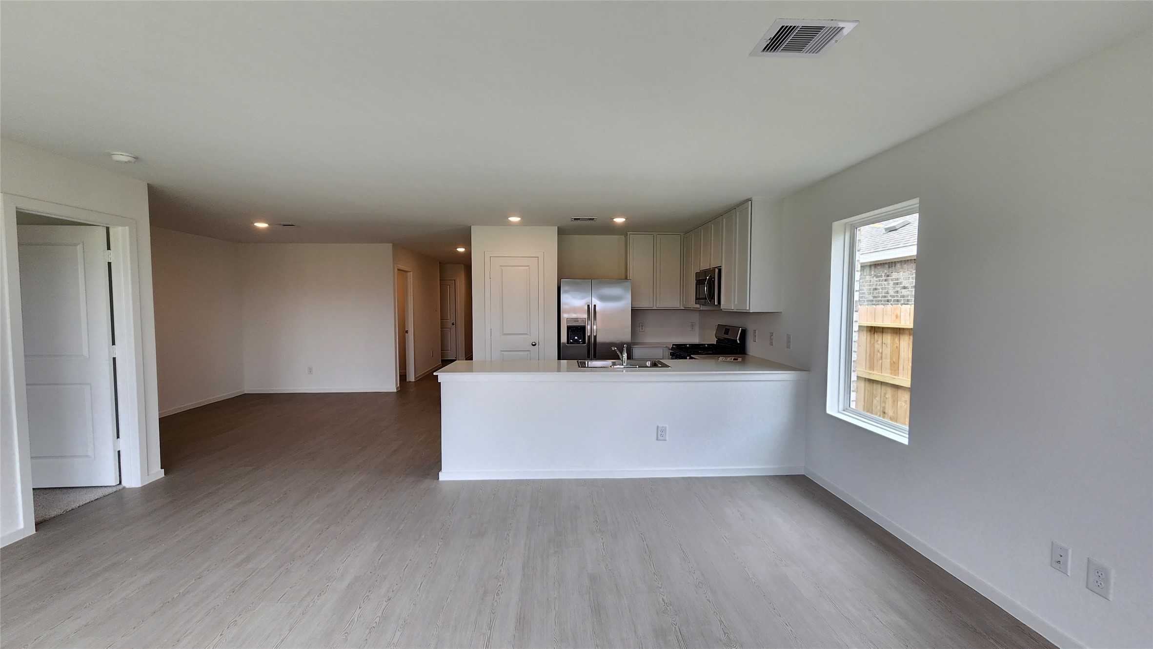29018 Rustic Windmill Way Hockley, TX 77447 - Photo 5 of 35 Family room to kitchen and dining area