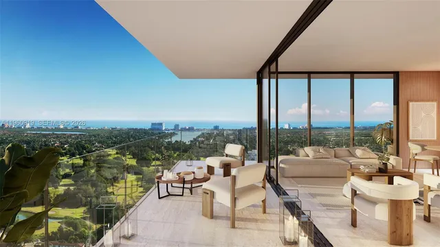 a view of a balcony with couches and city view