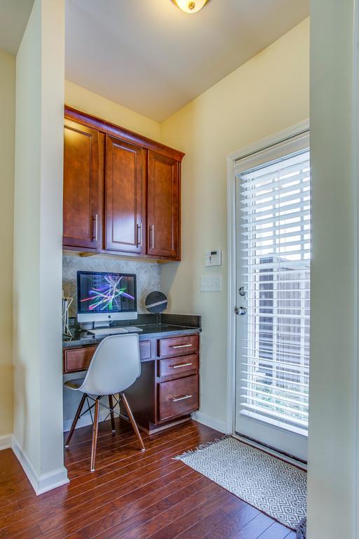 2046 Hemlock Drive Spring Hill, TN 37174 - Photo 14 of 28 a workspace with furniture and wooden floor