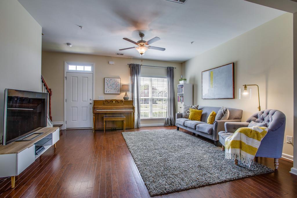 2046 Hemlock Drive Spring Hill, TN 37174 - Photo 3 of 28 a living room with furniture and a flat screen tv