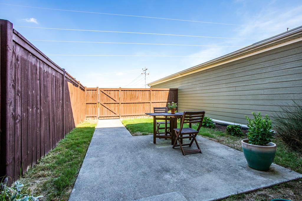 2046 Hemlock Drive Spring Hill, TN 37174 - Photo 25 of 28 a view of patio with chairs and potted plants