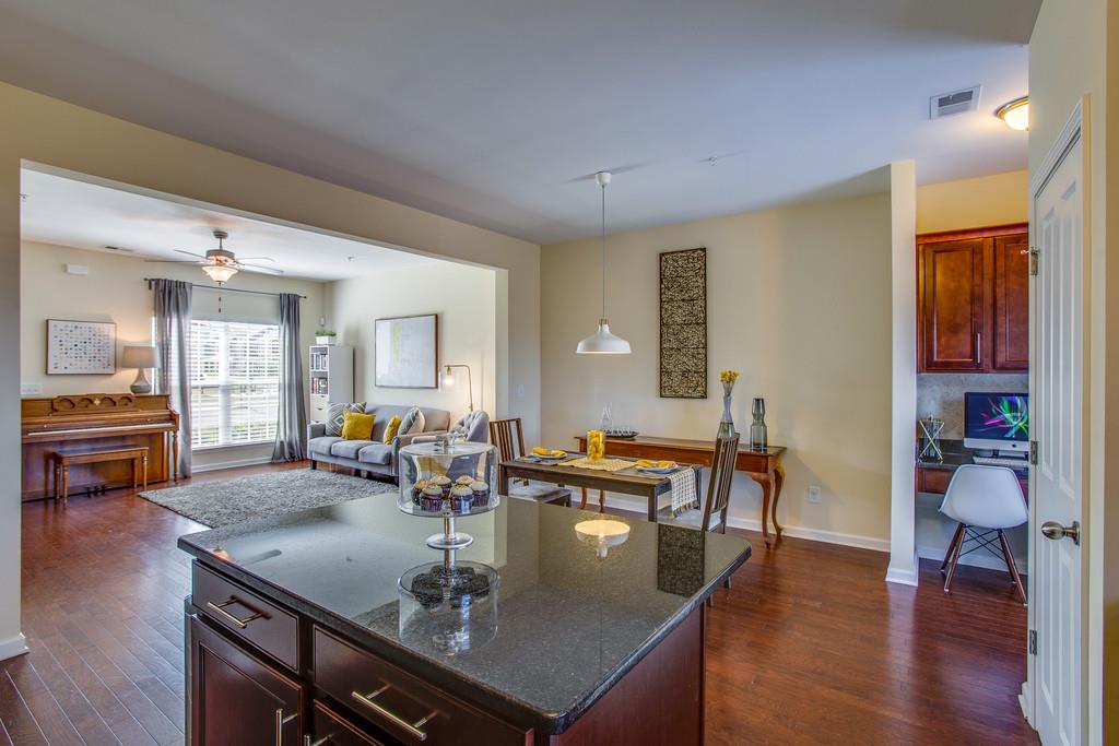 2046 Hemlock Drive Spring Hill, TN 37174 - Photo 10 of 28 a living room with dining room and wooden floor