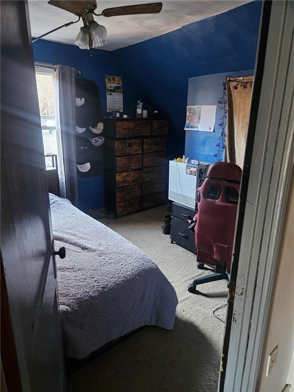 143 Whitestown Road Lyndora, PA 16045 - Photo 13 of 18 a bedroom with a bed and furniture