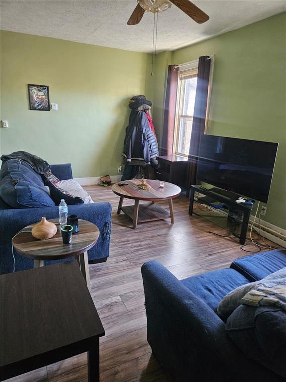 143 Whitestown Road Lyndora, PA 16045 - Photo 4 of 18 a living room with furniture and a flat screen tv