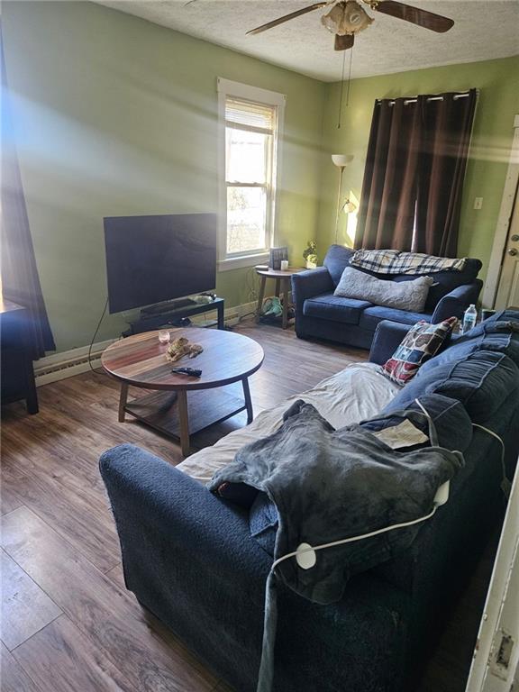 143 Whitestown Road Lyndora, PA 16045 - Photo 5 of 18 a living room with furniture and a window