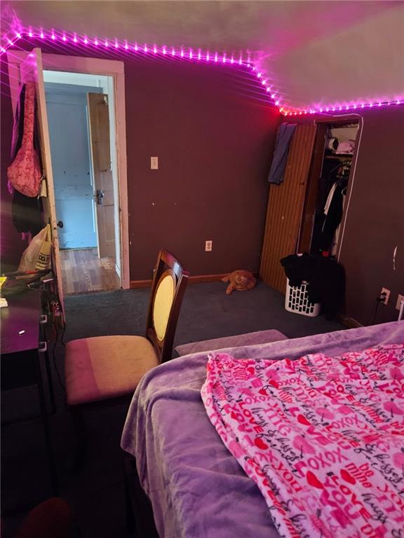 143 Whitestown Road Lyndora, PA 16045 - Photo 9 of 18 a bedroom with a bed and a mirror