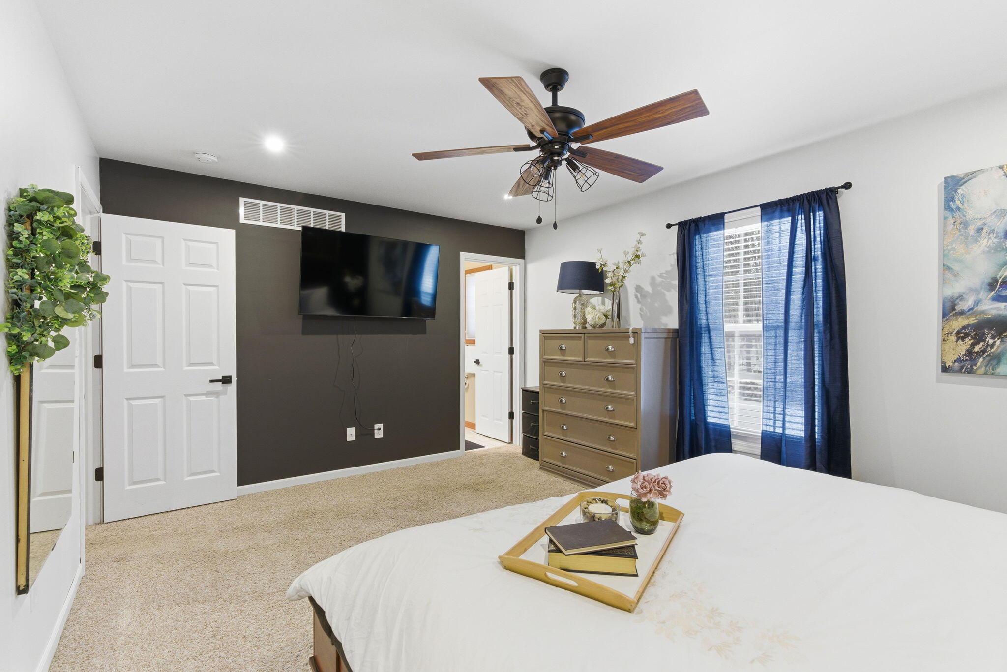 2726 North Goldring Road La Porte, IN 46350 - Photo 12 of 34 a bed room with a bed and a television