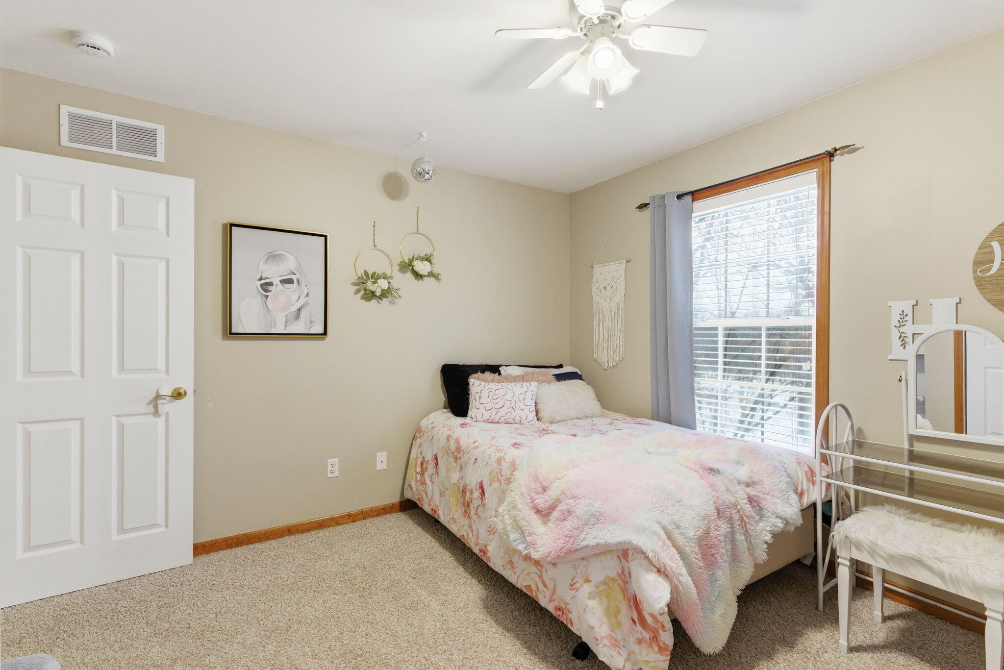 2726 North Goldring Road La Porte, IN 46350 - Photo 15 of 34 a bedroom with a bed and a chandelier