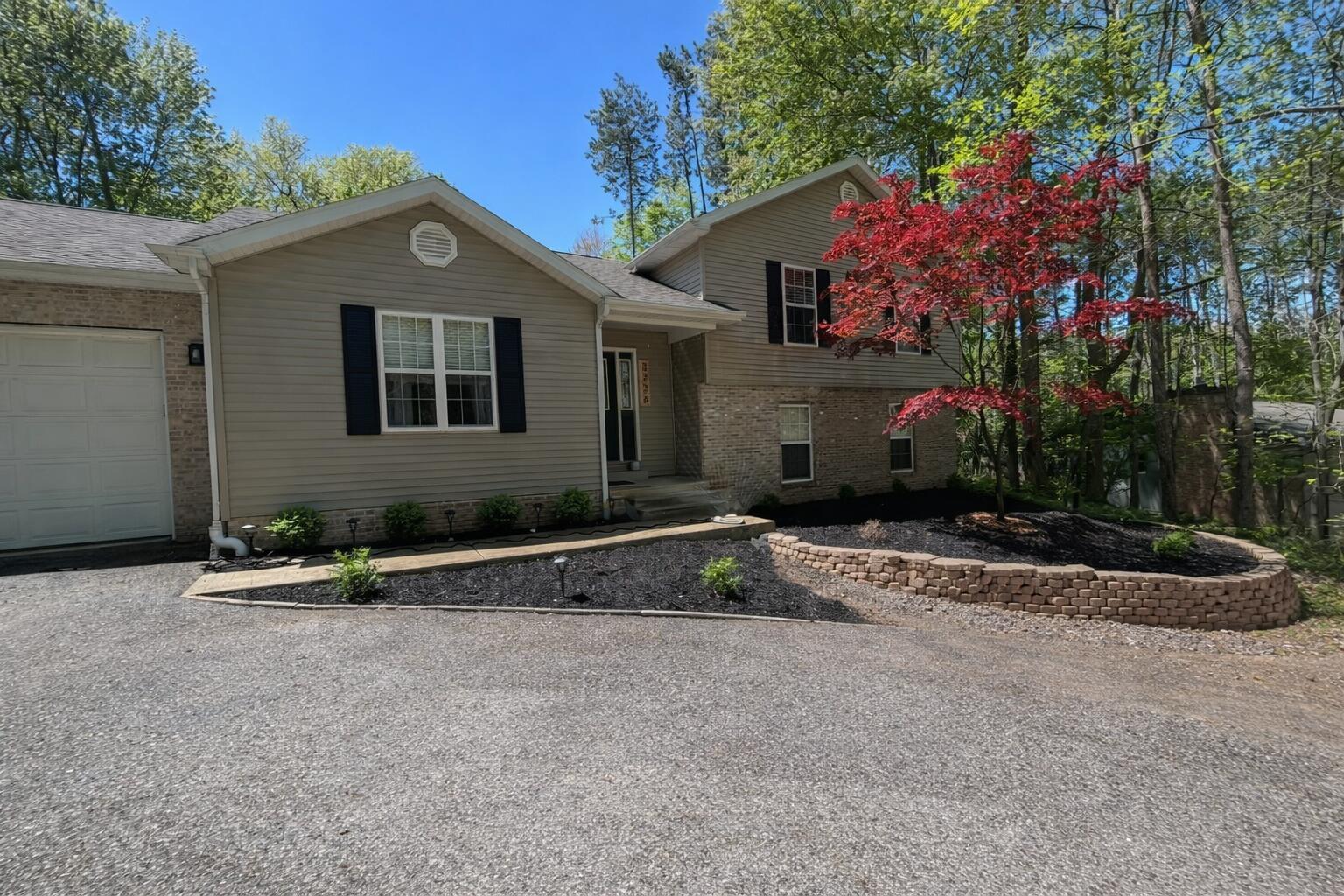 2726 North Goldring Road La Porte, IN 46350 - Photo 29 of 34 front view of a house with a yard