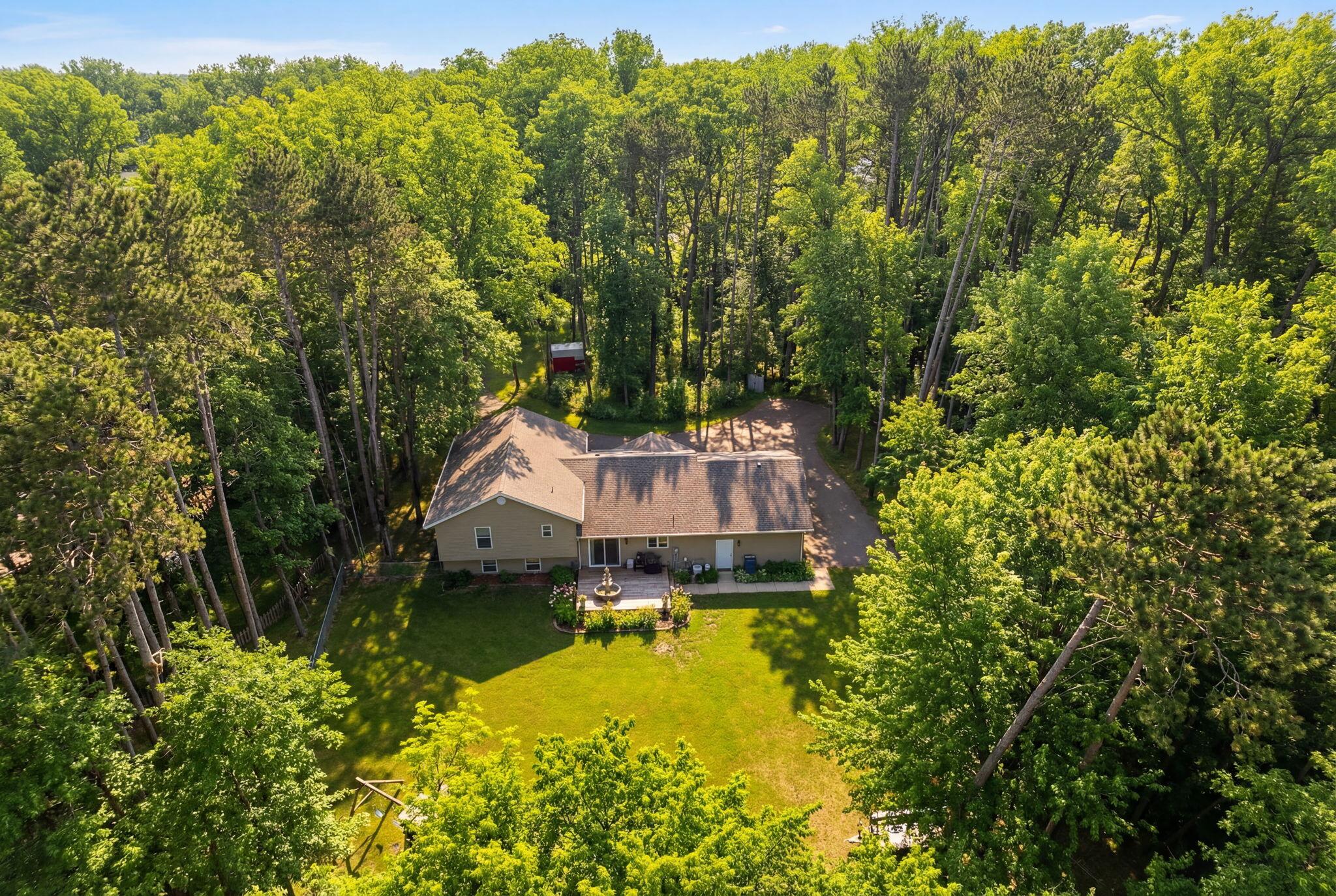 2726 North Goldring Road La Porte, IN 46350 - Photo 3 of 34 an aerial view of a house with swimming pool and garden view