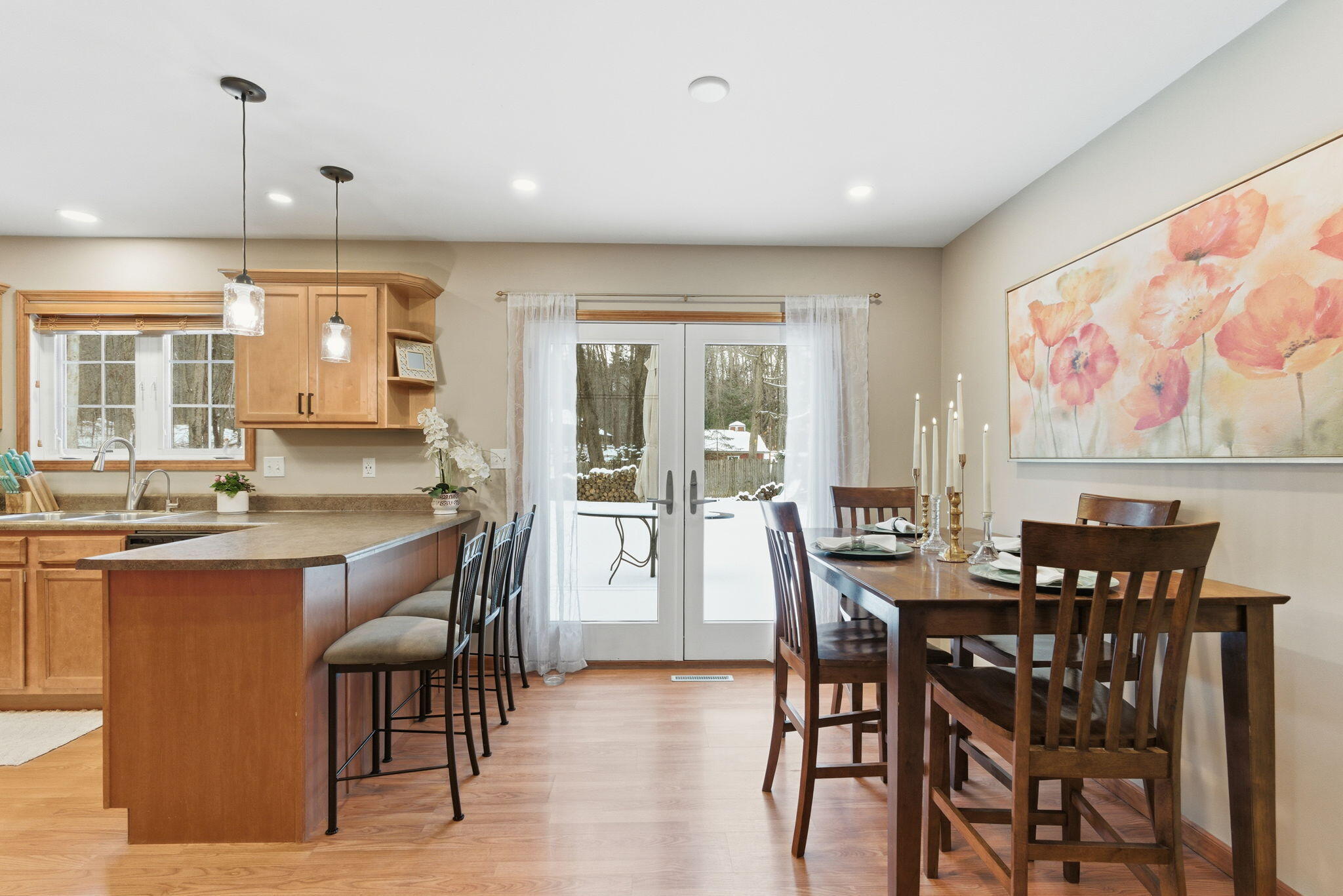 2726 North Goldring Road La Porte, IN 46350 - Photo 6 of 34 a dining hall with stainless steel appliances granite countertop a dining table and chairs with wooden floor
