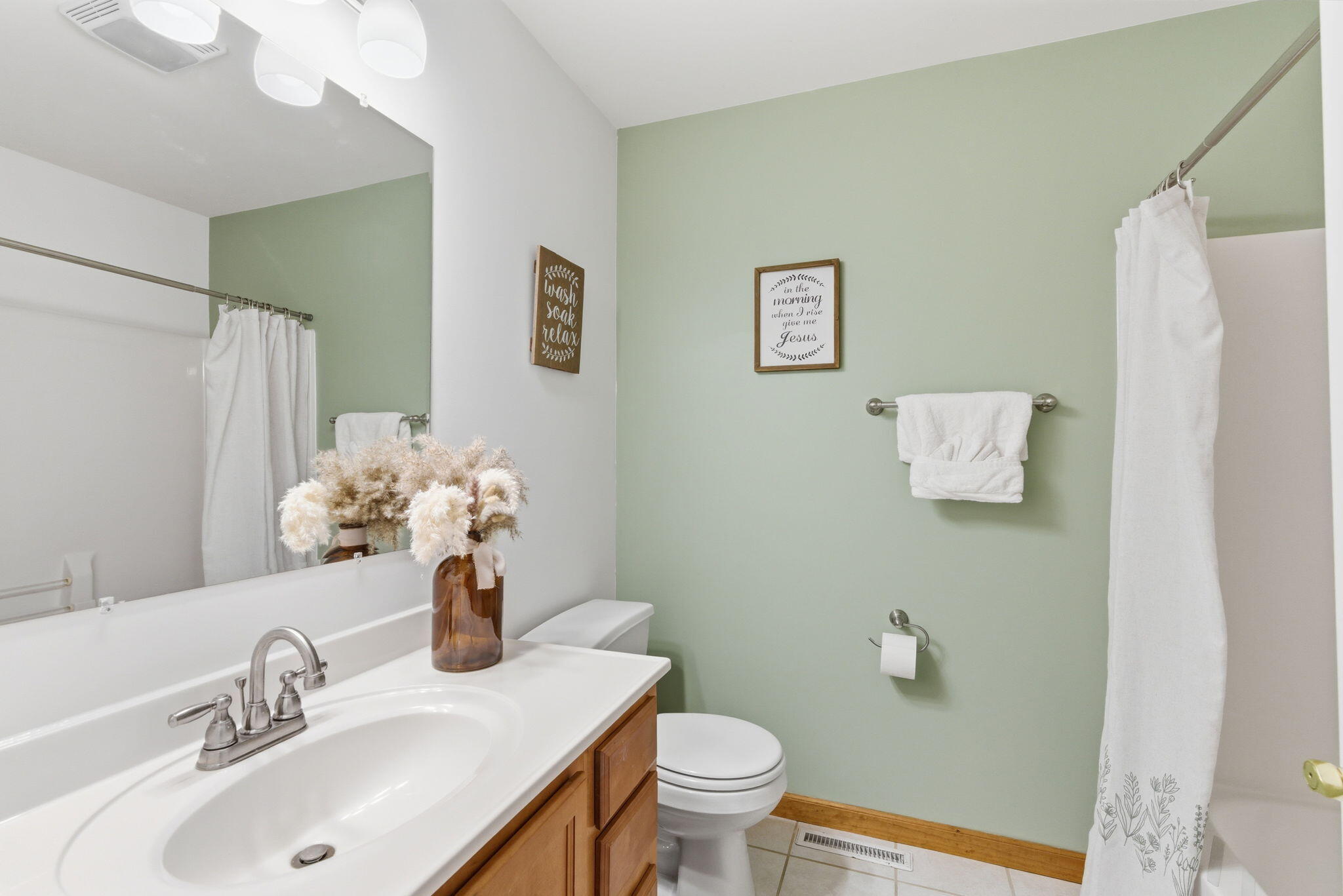 2726 North Goldring Road La Porte, IN 46350 - Photo 10 of 34 a bathroom with a sink toilet and shower
