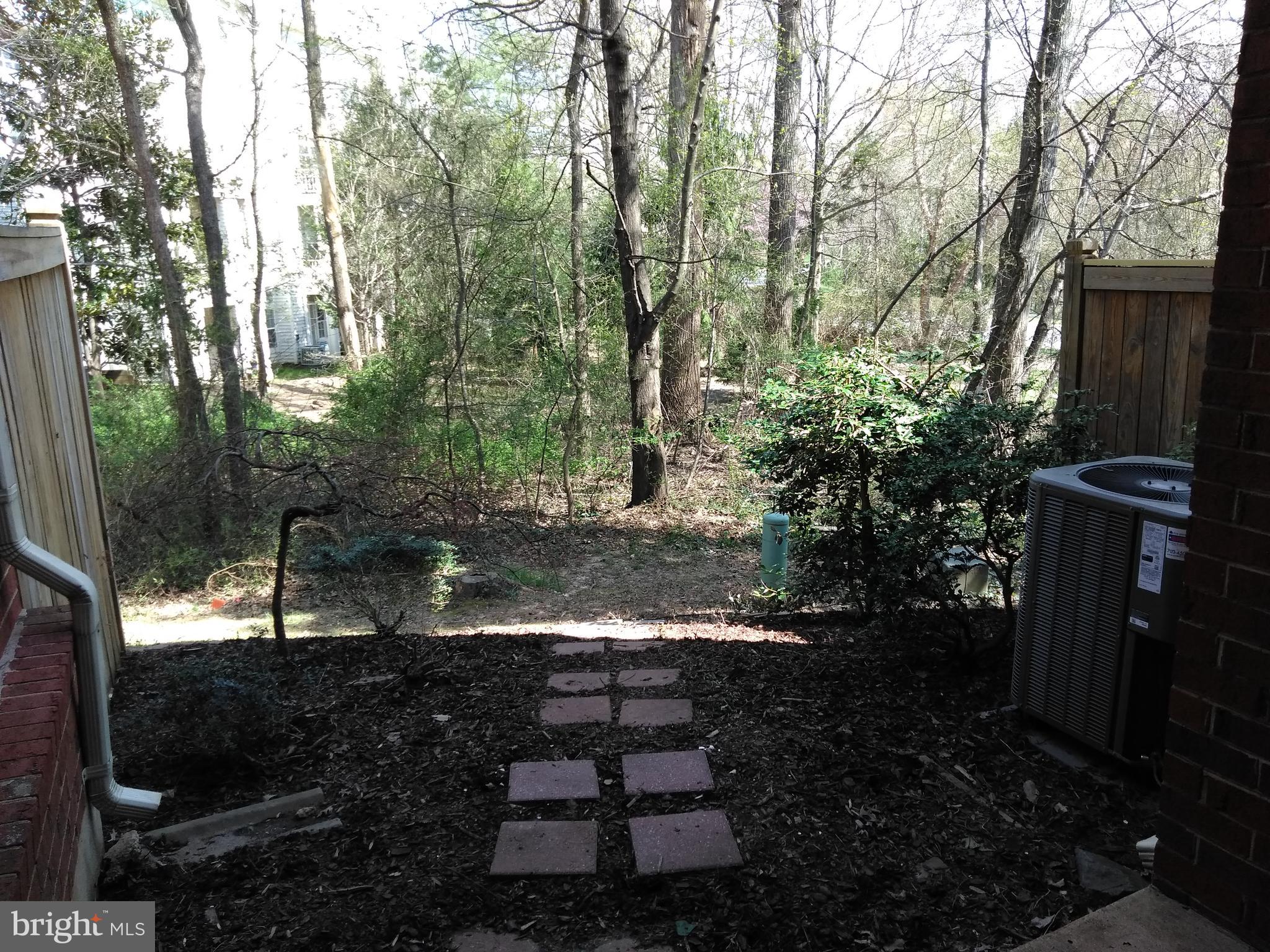 1384 Park Garden Lane Reston, VA 20194 - Photo 13 of 17 a view of a back yard