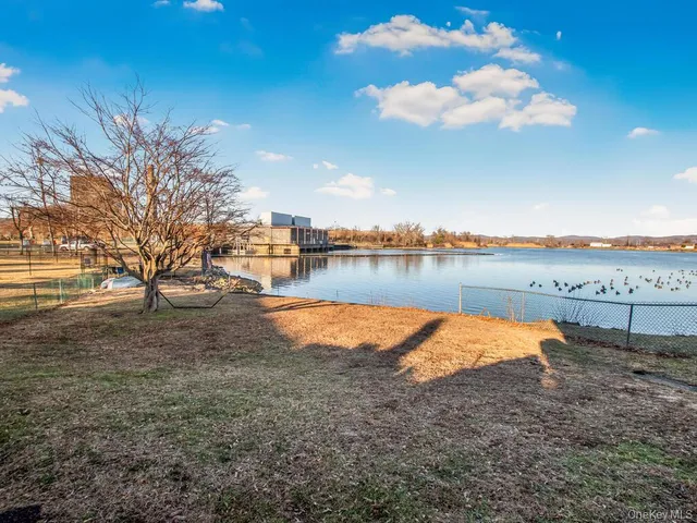 a view of lake with outdoor space