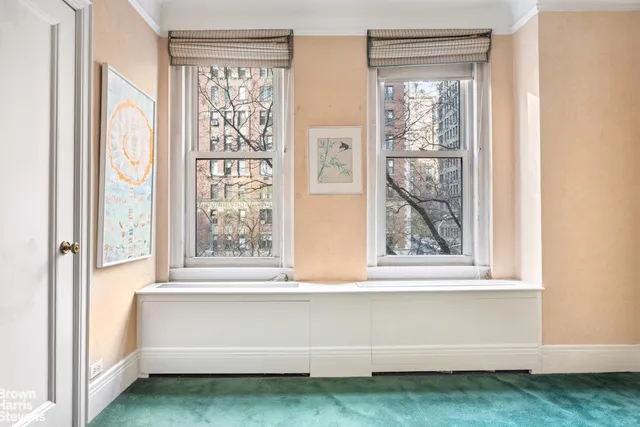 a view of room with window and a yard