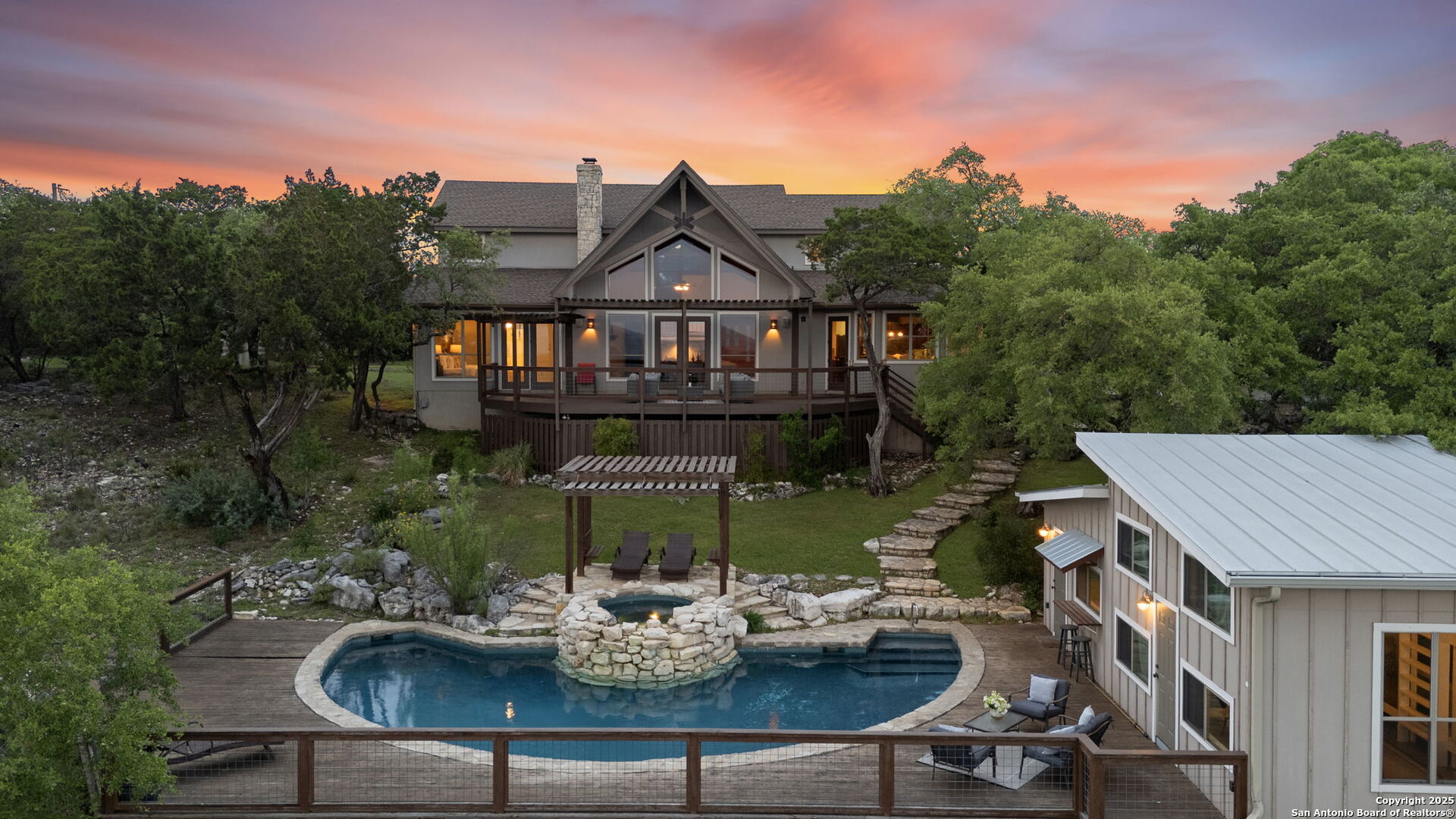 104 High Sierra Drive Boerne, TX 78006 - Photo 1 of 57 a view of a house with patio and a garden