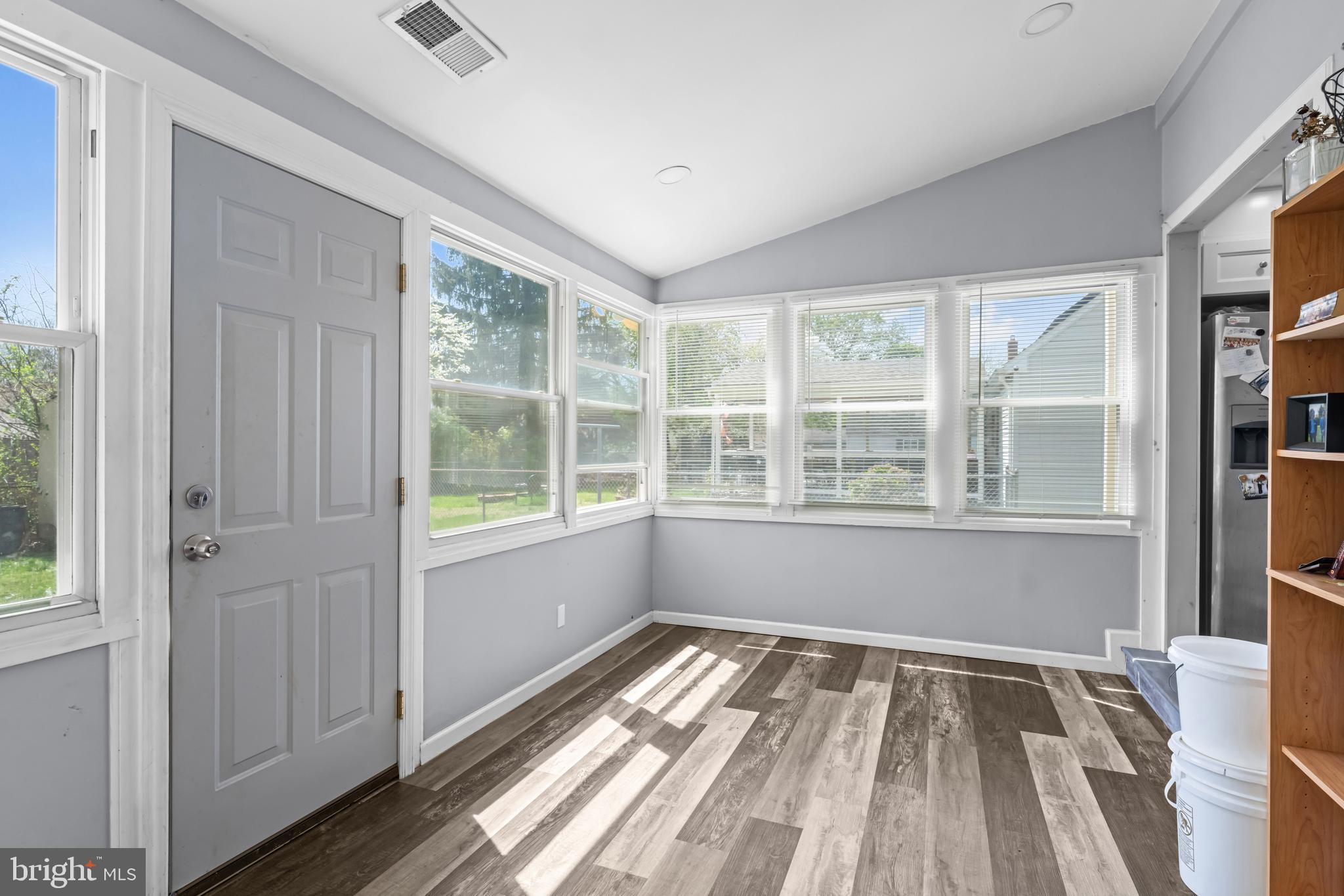 205 Nicholson Road Mount Ephraim, NJ 08059 - Photo 15 of 24 a view of wooden floor cabinets and windows in a room