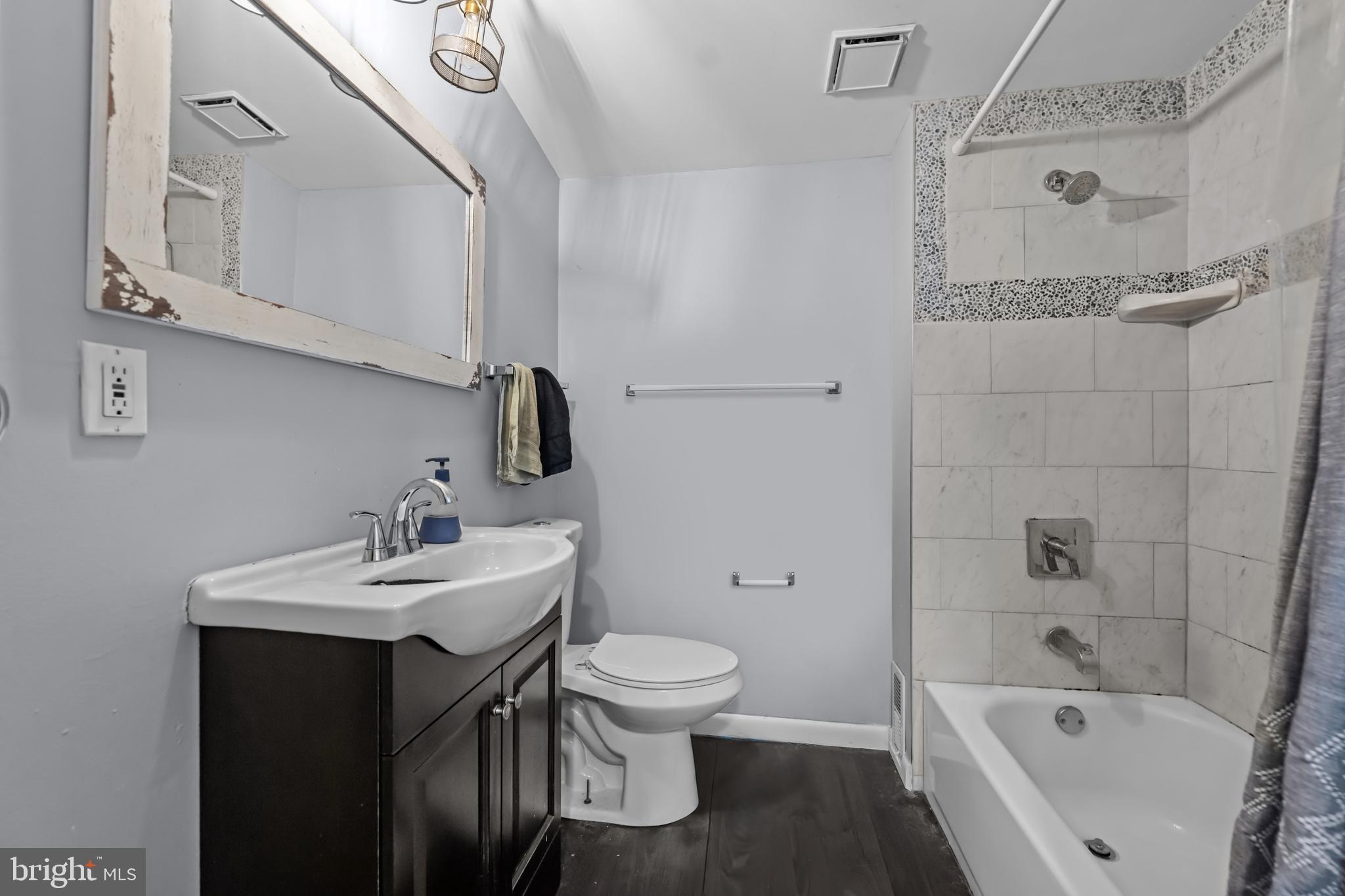 205 Nicholson Road Mount Ephraim, NJ 08059 - Photo 20 of 24 a bathroom with a sink toilet tub and vanity