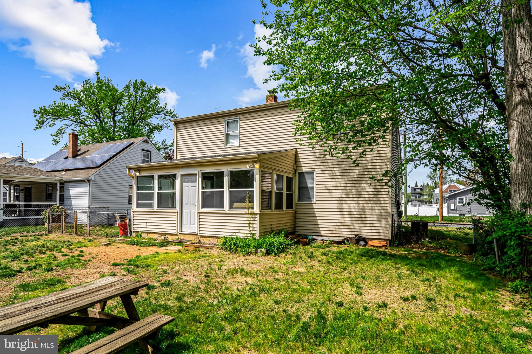 205 Nicholson Road Mount Ephraim, NJ 08059 - Photo 22 of 24 a front view of a house with a garden