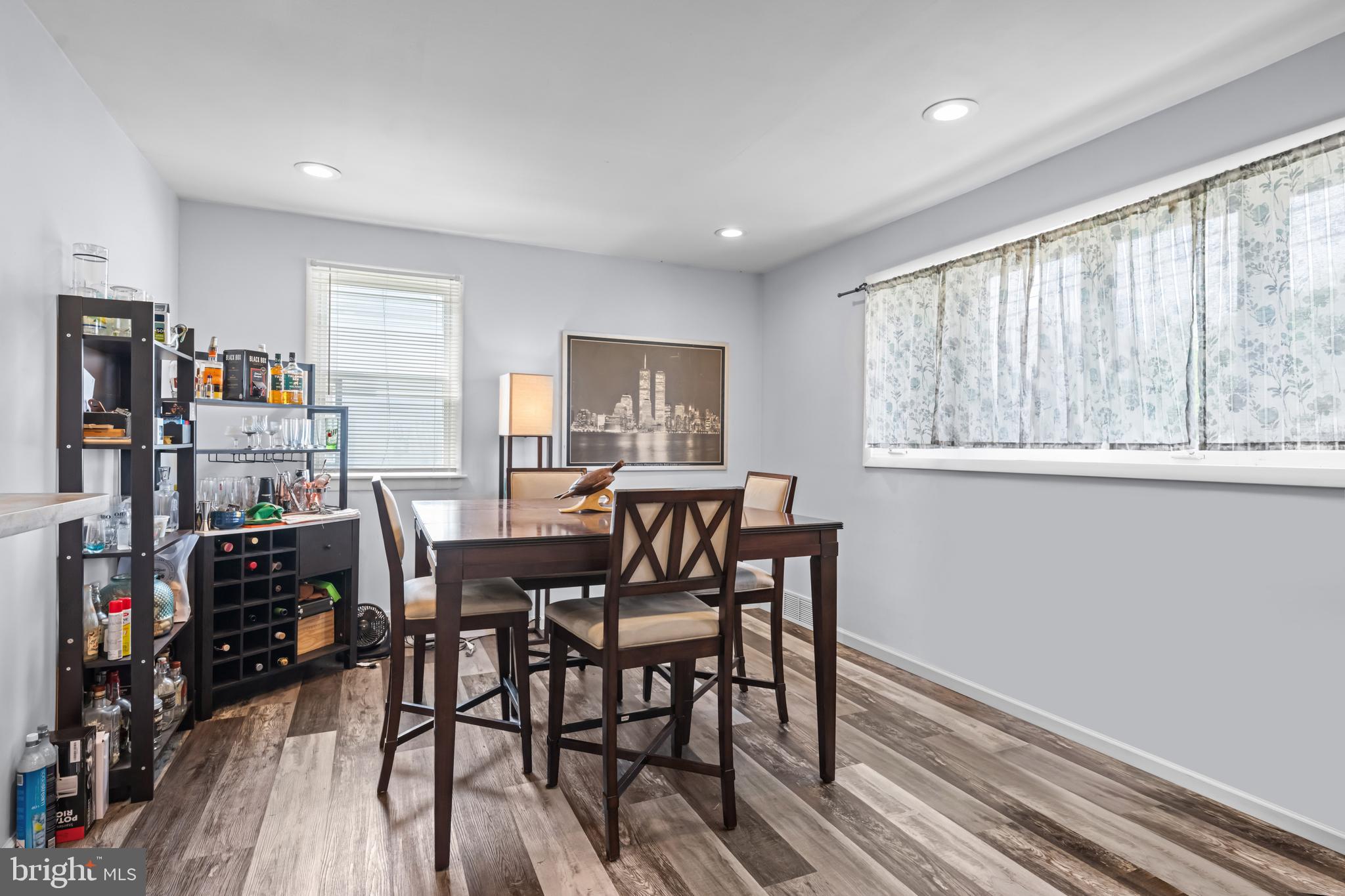 205 Nicholson Road Mount Ephraim, NJ 08059 - Photo 8 of 24 a view of a dining room with furniture window and wooden floor