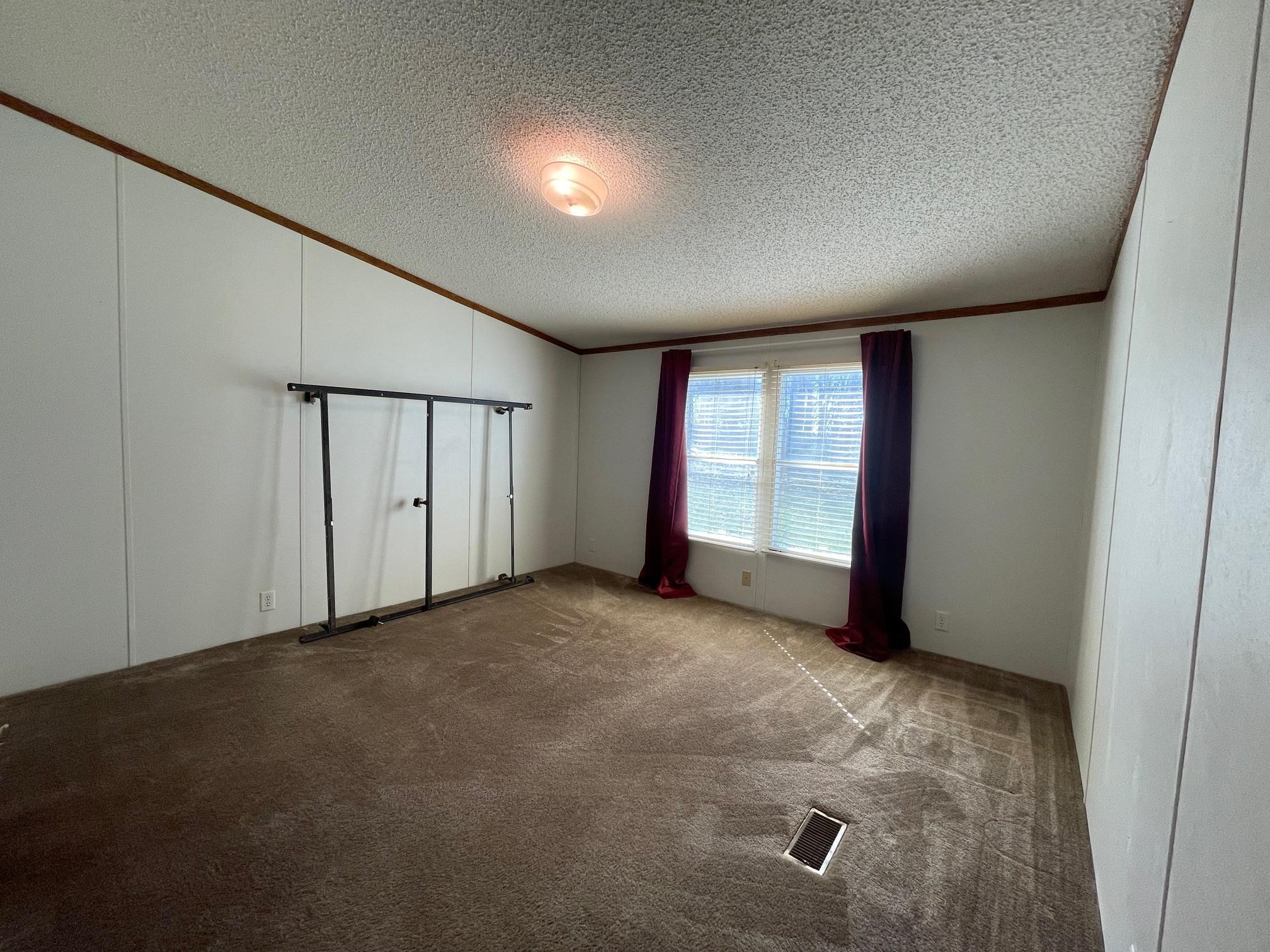 9597 Deadfall Road Brighton, TN 38011 - Photo 15 of 22 an empty room with windows