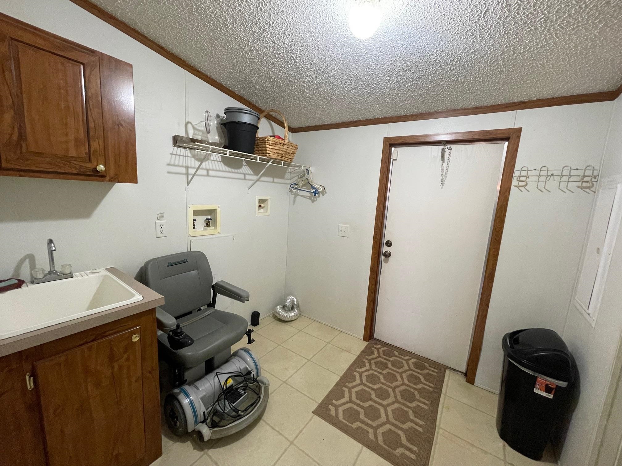 9597 Deadfall Road Brighton, TN 38011 - Photo 18 of 22 a bathroom with sink and mirror