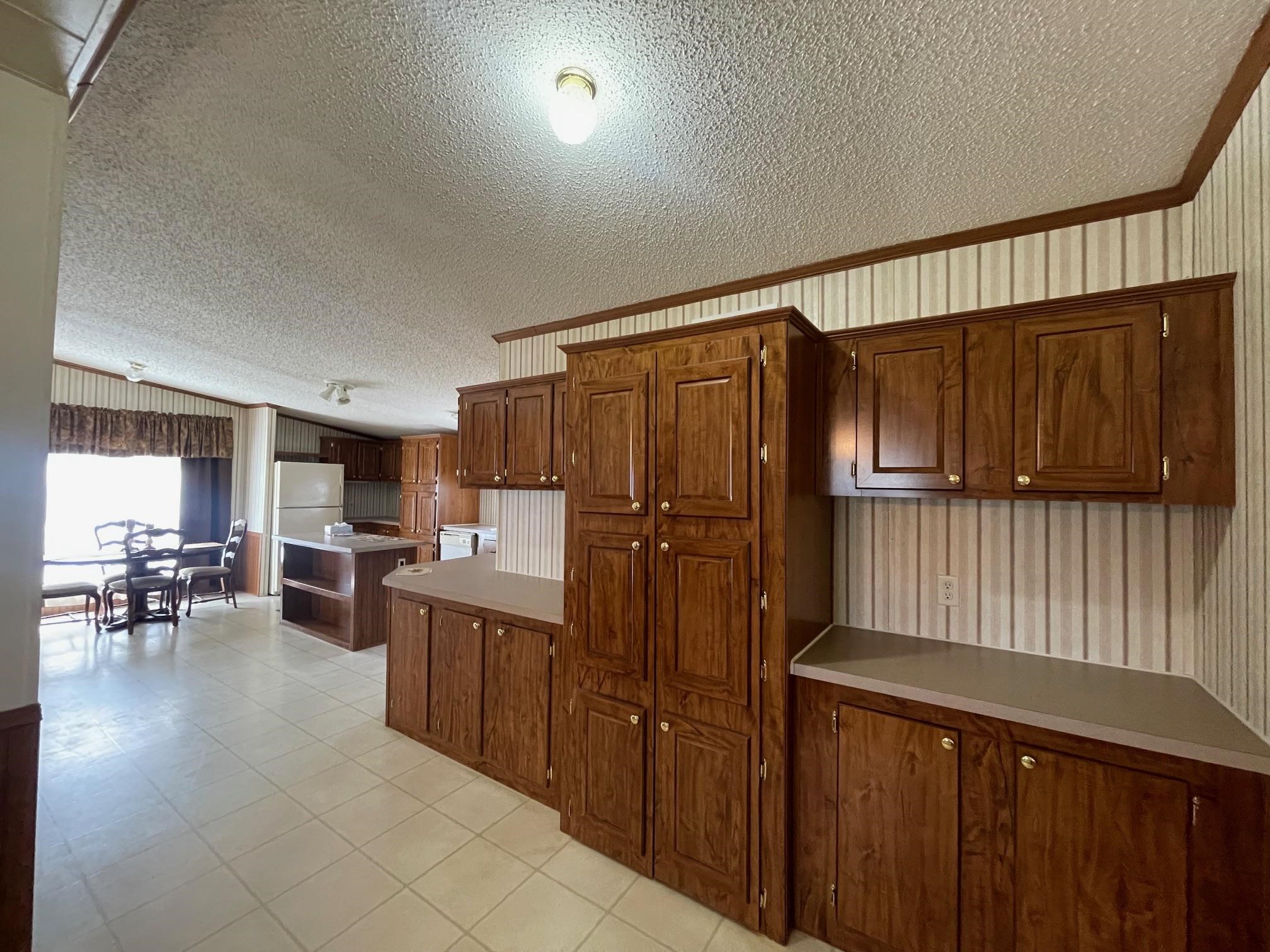 9597 Deadfall Road Brighton, TN 38011 - Photo 3 of 22 a kitchen with lots of counter top space and appliances