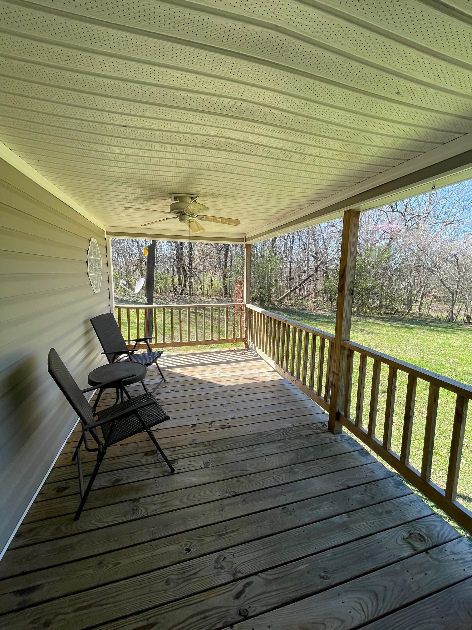 9597 Deadfall Road Brighton, TN 38011 - Photo 7 of 22 a view of a patio with wooden floor